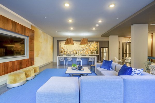 Clubhouse at Cadence at Frisco Station Apartments featuring modern design in Frisco