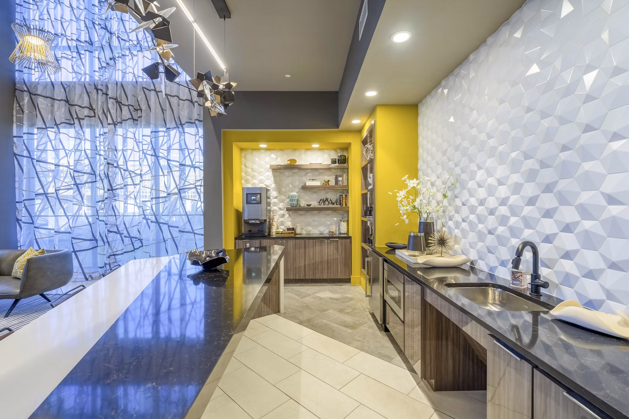 Modern clubhouse with sleek design at Cadence at Frisco Station Apartments, featuring comfortable seating and entertainment areas