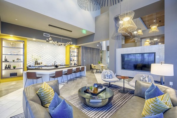 Clubhouse featuring modern design elements at Cadence at Frisco Station Apartments
