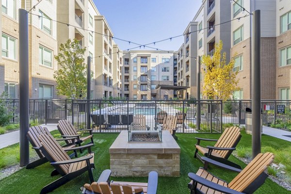 fire pit at Cadence at Frisco Station Apartments