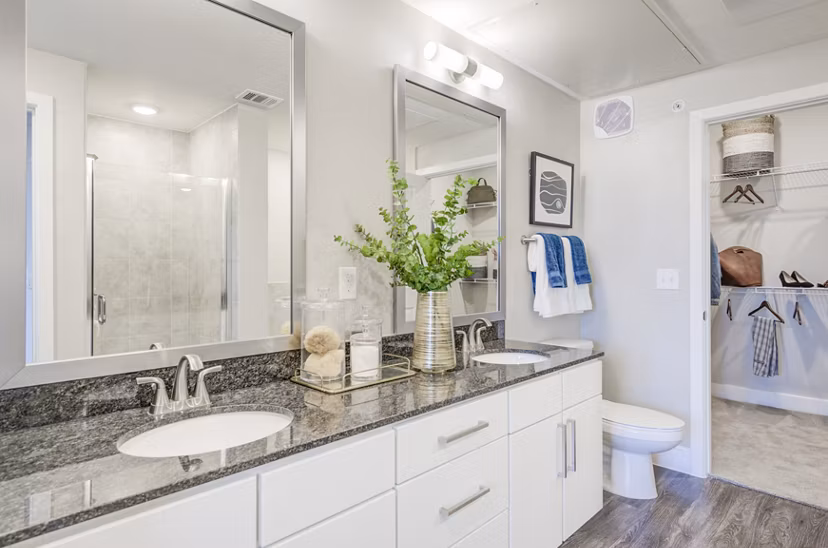 Modern bathroom with sleek fixtures at The Link at Twin Creeks Apartments