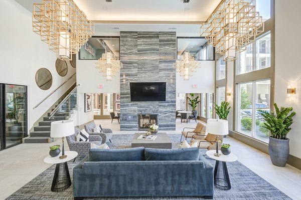 Elegant clubhouse with modern decor at The Link at Twin Creeks Apartments