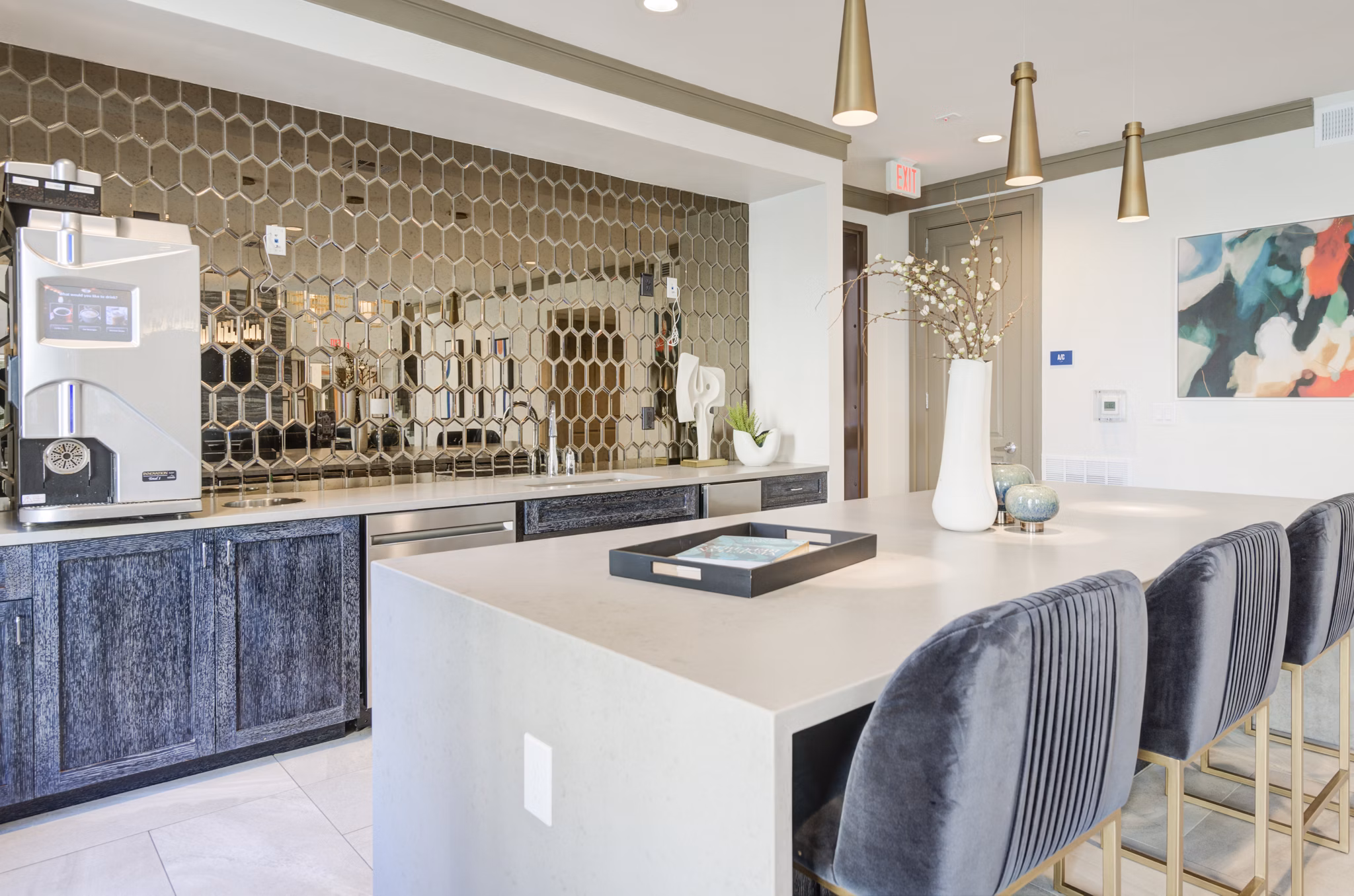 Modern clubhouse with contemporary decor at The Link at Twin Creeks Apartments