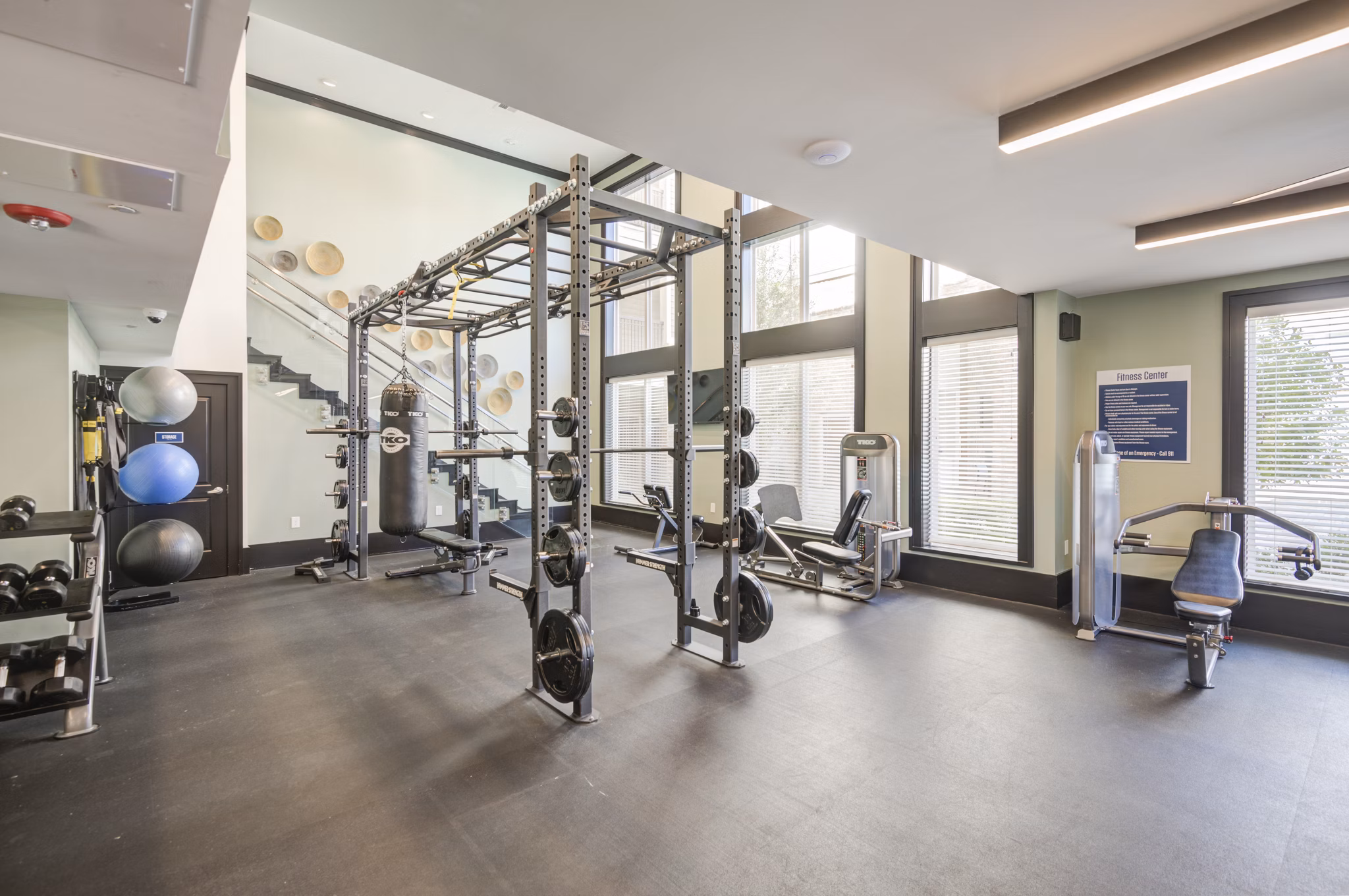 Modern fitness center with cutting-edge equipment at The Link at Twin Creeks Apartments, ideal for active lifestyles and wellness-focused residents
