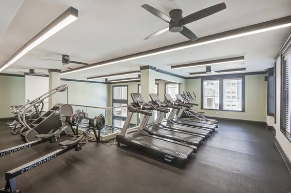 fitness center at The Link at Twin Creeks Apartments