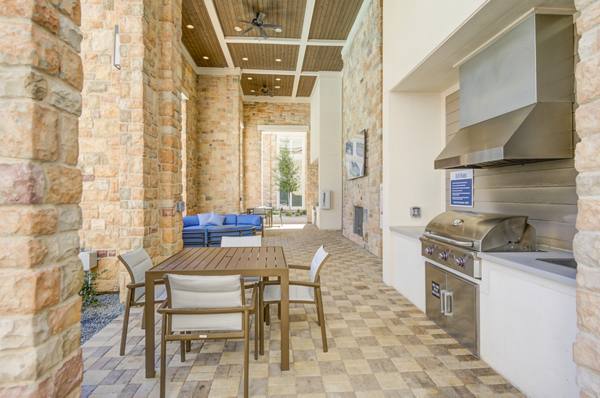 grill area at The Link at Twin Creeks Apartments