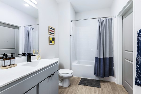 bathroom at Beyond Woodbury Apartments