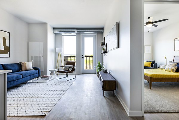 Modern living room with contemporary furnishings in Beyond Woodbury Apartments