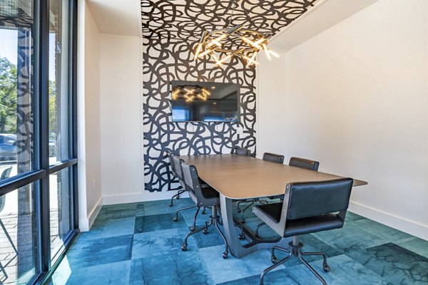 Modern clubhouse meeting facility at The Accolade Collegiate Village West Apartments, designed to facilitate gatherings and collaborative events