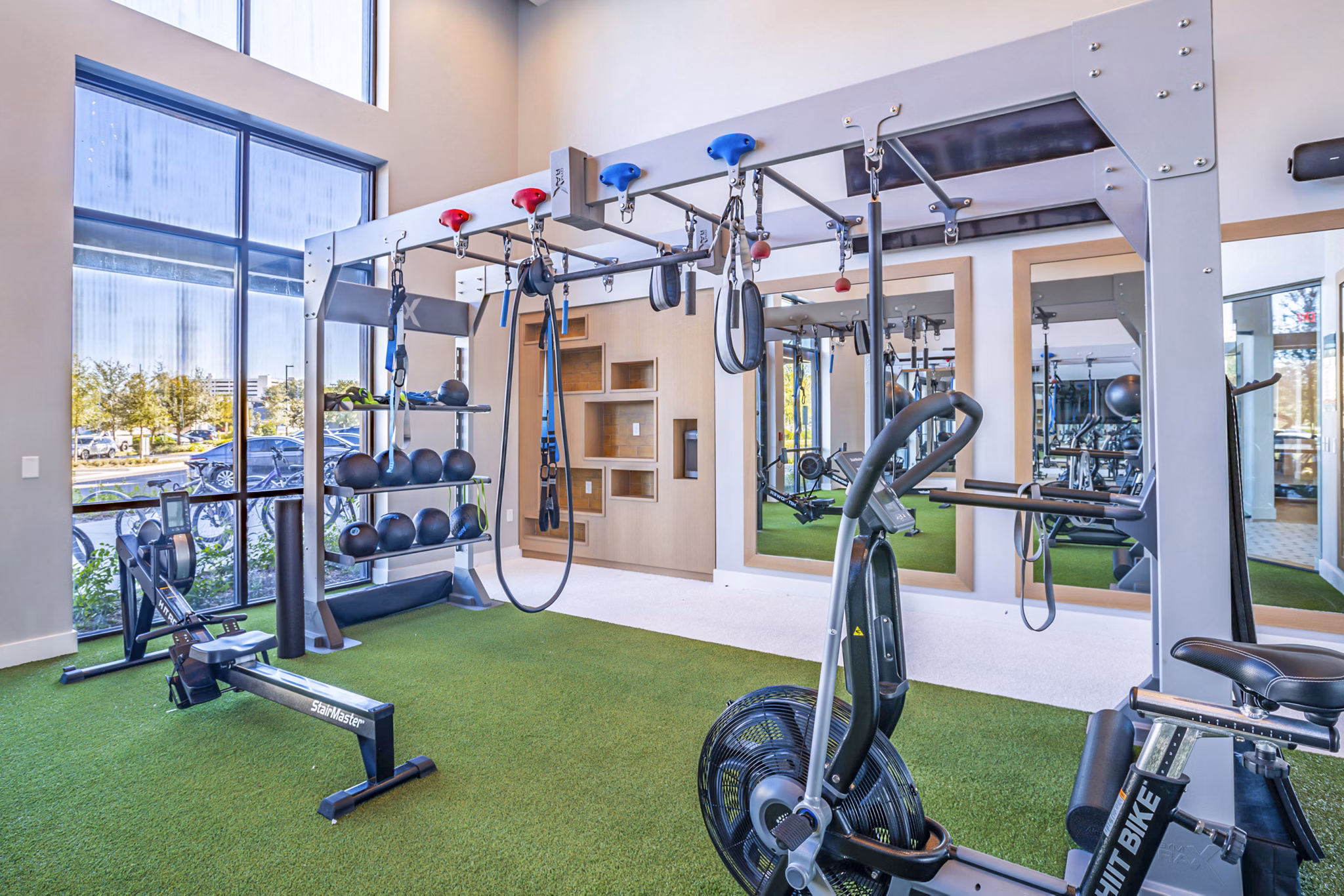 Modern fitness center with state-of-the-art equipment at The Accolade Collegiate Village West Apartments