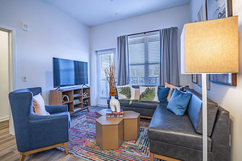 Modern living room with sleek furnishings at The Accolade Collegiate Village West, luxury apartments in Orlando