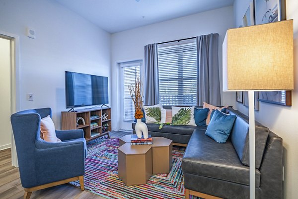 Modern living room with sleek furnishings at The Accolade Collegiate Village West, luxury apartments in Orlando