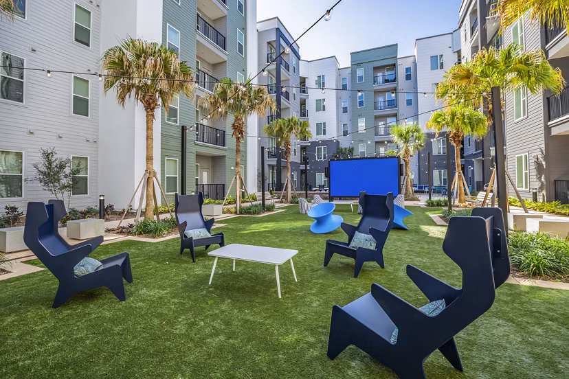 Spacious patio with modern seating at The Accolade Collegiate Village West Apartments