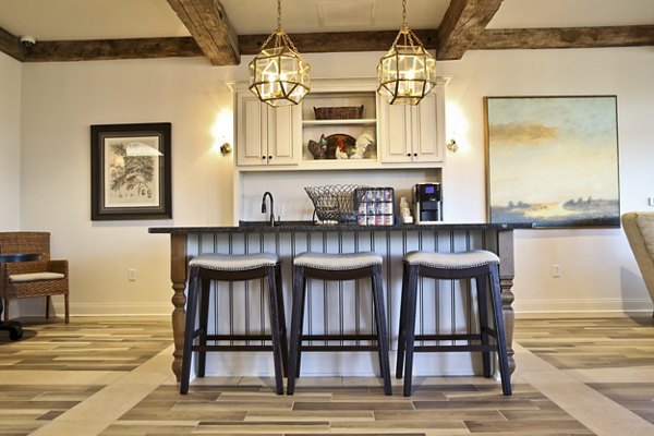 Stylish clubhouse featuring modern decor at Savannah West Apartments, ideal for social gatherings and relaxation