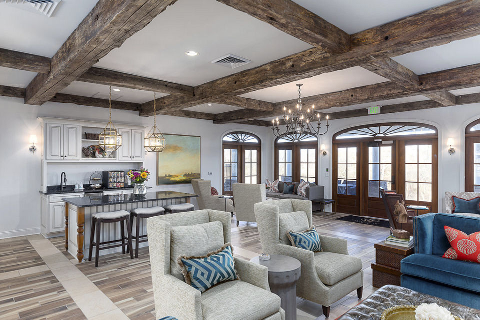 Modern clubhouse featuring social lounge and fireplace at Savannah West Apartments, a luxury apartment community