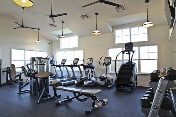 Fitness center with state-of-the-art equipment at Savannah West Apartments, offering modern amenities for active lifestyles