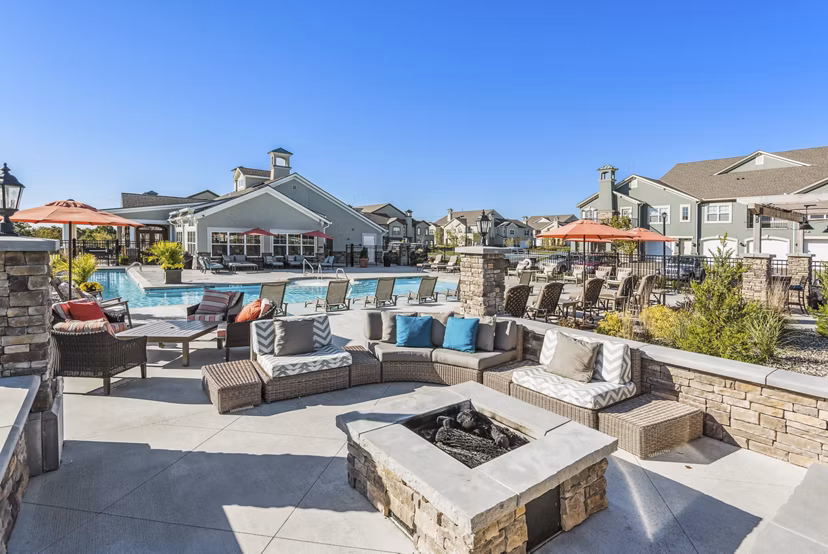 Cozy evening fire pit at Savannah West Apartments, ideal for gatherings and relaxation in a luxurious setting
