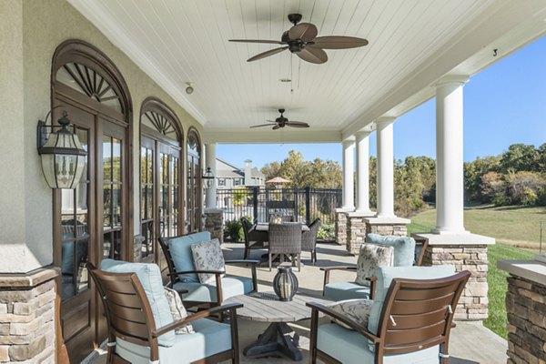 Inviting outdoor patio with modern seating at Savannah West Apartments providing a relaxing space to enjoy in Kansas City