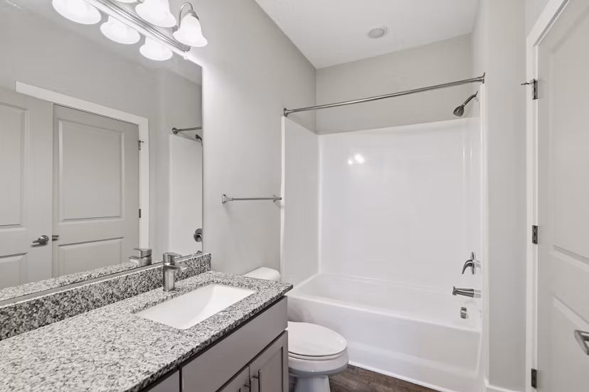 Modern bathroom with sleek fixtures at The Arden Apartments