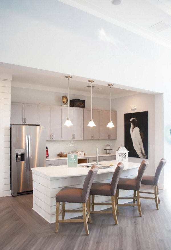 Clubhouse at The Arden Apartments: Modern community space with seating and games, luxury apartments by Greystar in Charlotte, NC