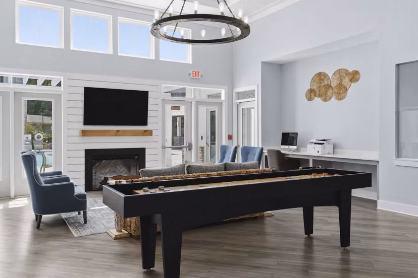 Luxurious clubhouse with modern seating and decor at The Arden Apartments, perfect for social gatherings and relaxation