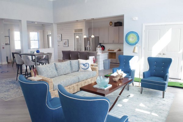 Luxurious clubhouse with modern seating and decor at The Arden Apartments, perfect for social gatherings and relaxation