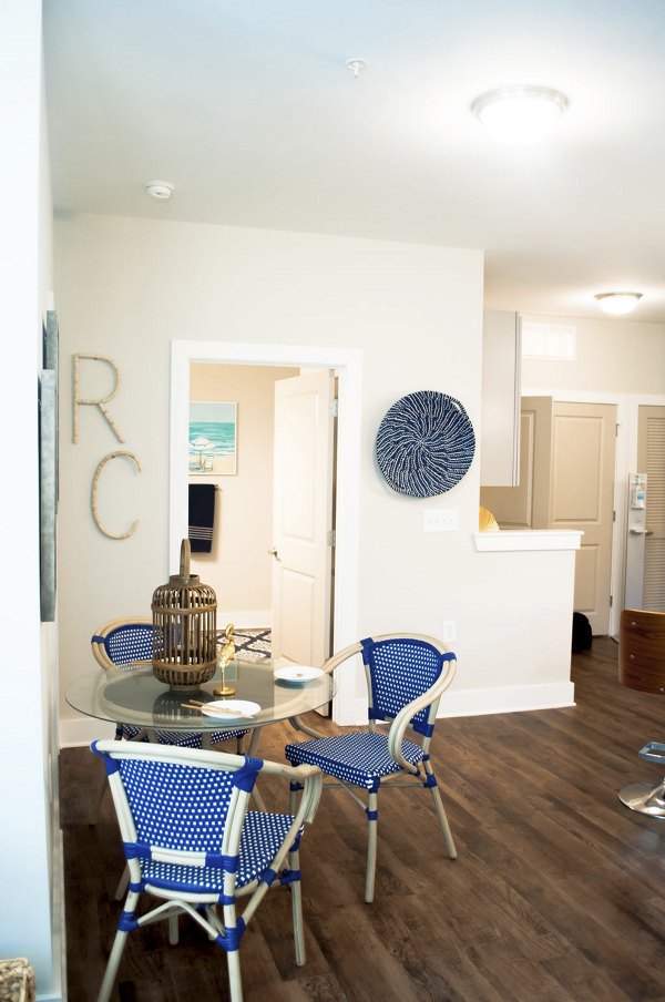Dining area with modern decor and natural light at The Arden Apartments