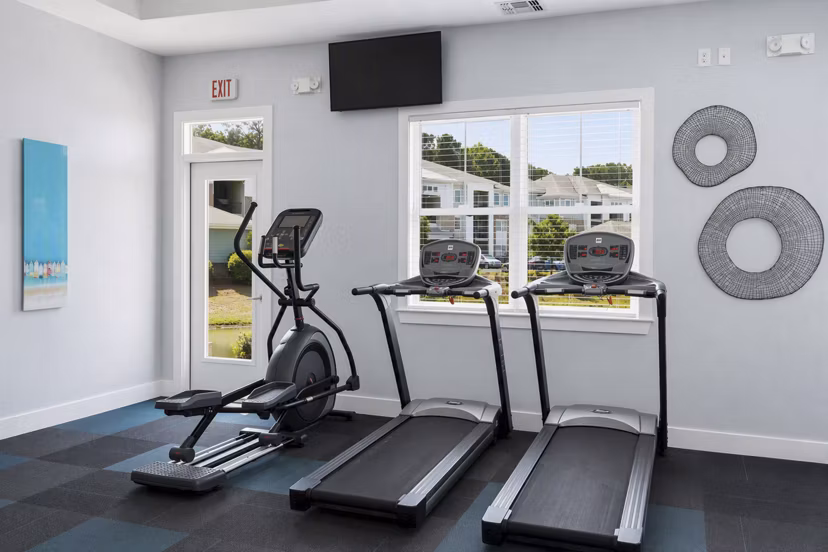 Fitness center featuring modern equipment at The Arden Apartments