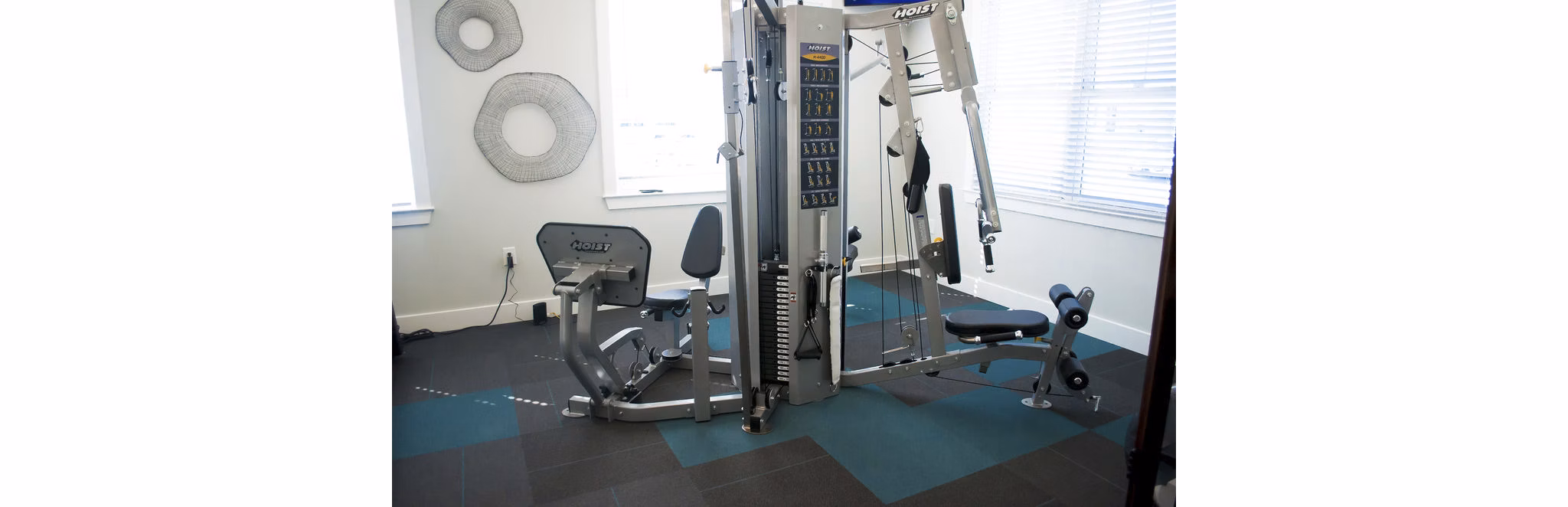 Fitness center featuring modern equipment at The Arden Apartments