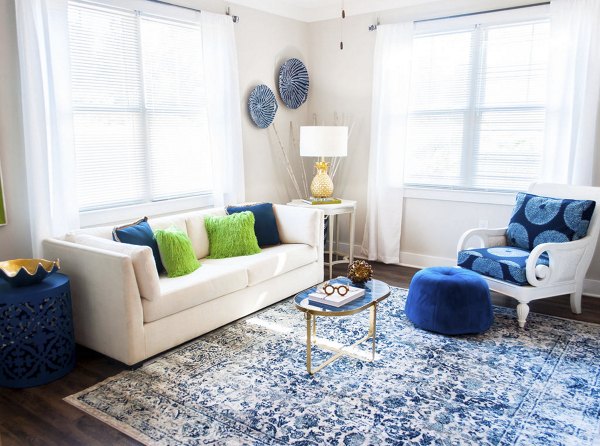 Spacious living room with modern decor in The Arden Apartments, showcasing luxury and comfort