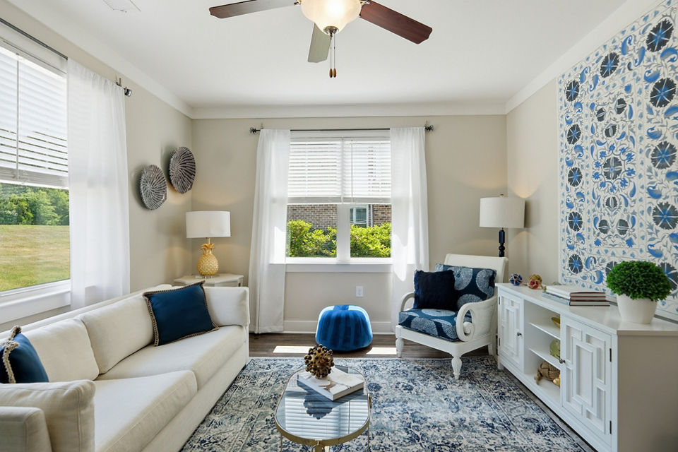 Spacious living room with modern decor in The Arden Apartments, showcasing luxury and comfort