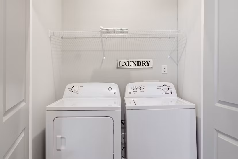 Laundry room with state-of-the-art appliances at The Arden Apartments, a Greystar luxury residence