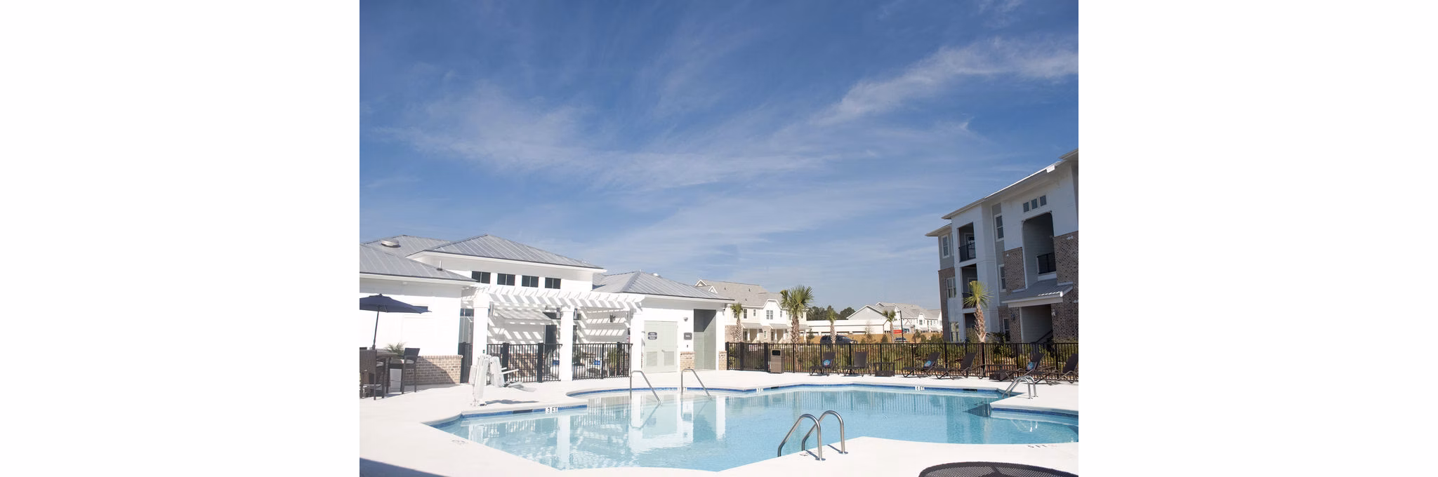 Resort-style pool area at The Arden Apartments, offering luxury leisure experience with modern amenities
