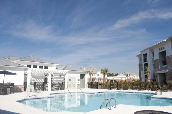Resort-style pool area at The Arden Apartments, offering luxury leisure experience with modern amenities