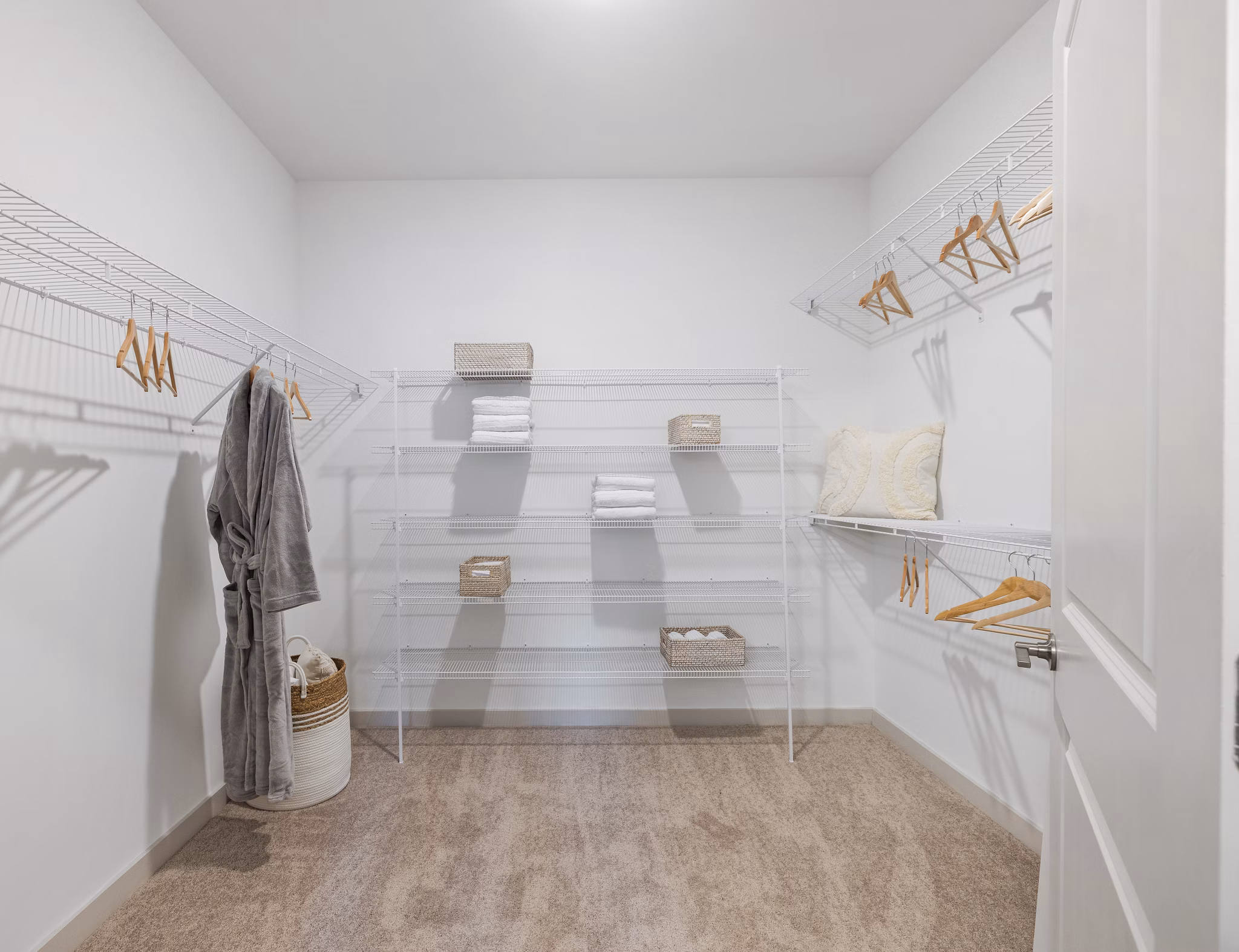 Modern closet with built-in shelving in a bedroom at Album Huntersville Apartments, ideal for organized living