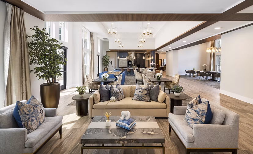 Elegant modern clubhouse at Album Huntersville Apartments, perfect for social gatherings and community events