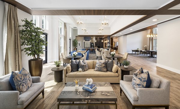 Elegant modern clubhouse at Album Huntersville Apartments, perfect for social gatherings and community events