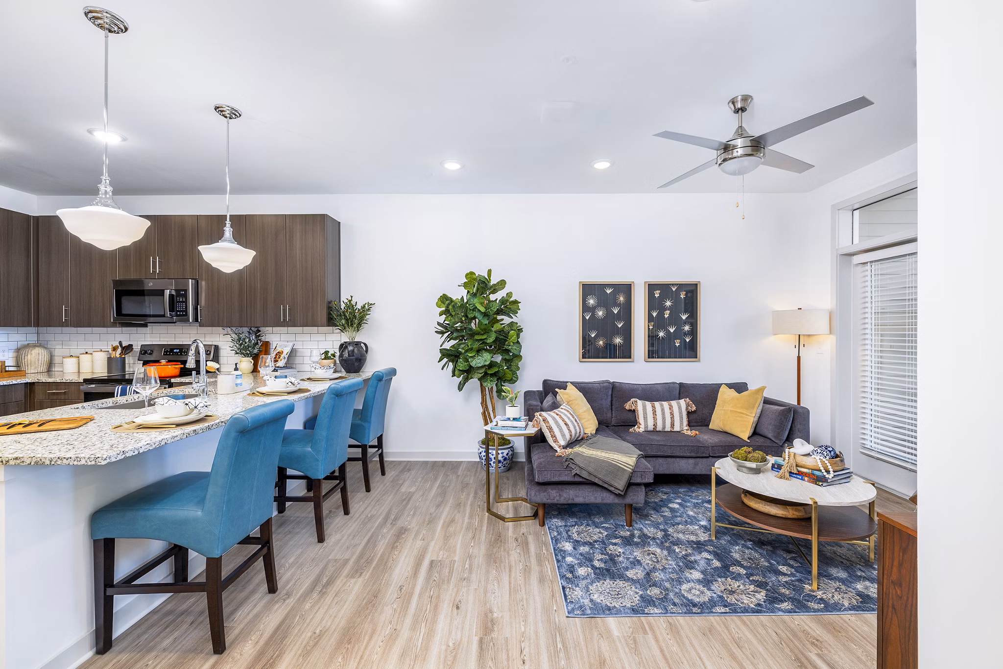 Spacious living room with modern decor in Album Huntersville Apartments, Greystar luxury apartments in Huntersville