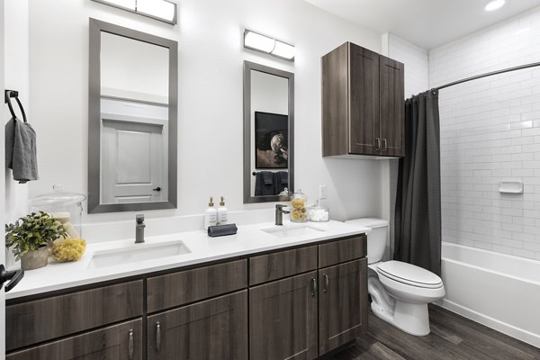 Luxurious bathroom with modern fixtures at The Vaughan Apartments, offering elegance and comfort for residents