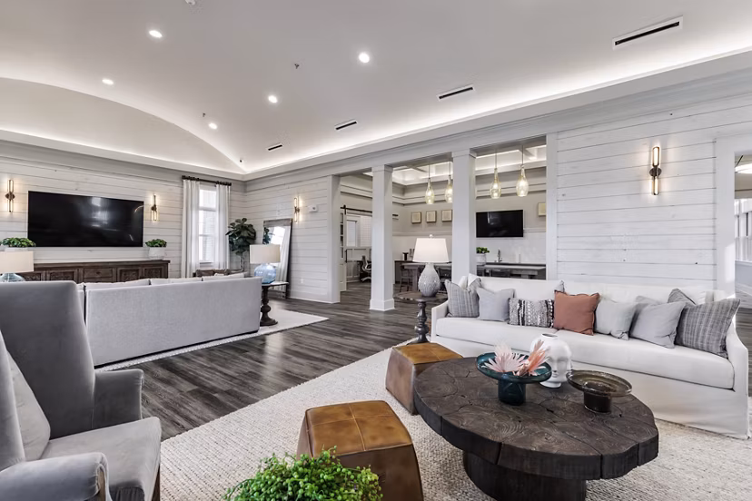 Elegant clubhouse with modern design elements at The Vaughan Apartments, offering versatile spaces for relaxation and social gatherings