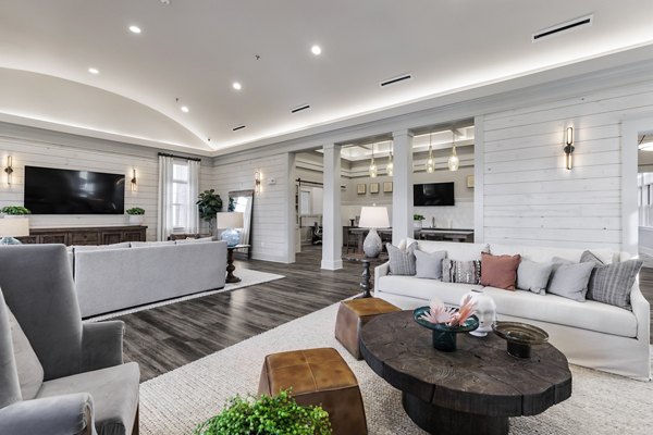 Elegant clubhouse with modern design elements at The Vaughan Apartments, offering versatile spaces for relaxation and social gatherings