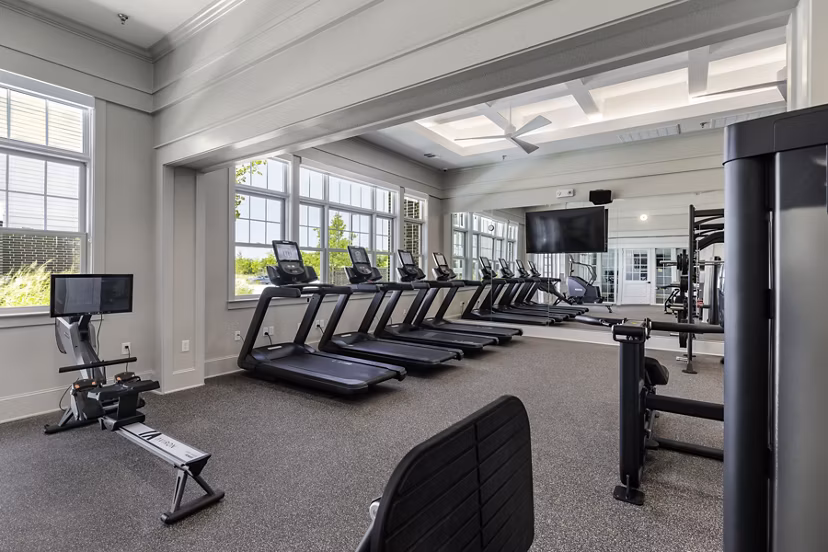 State-of-the-art fitness center with modern equipment at The Vaughan Apartments for resident wellness and workouts