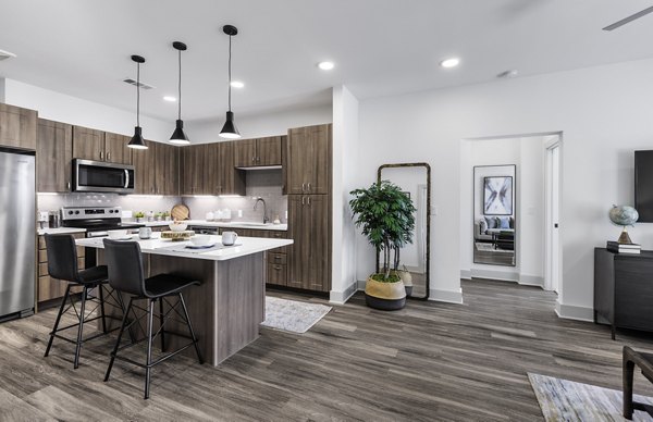 Spacious open-concept kitchen with state-of-the-art appliances at The Vaughan Apartments