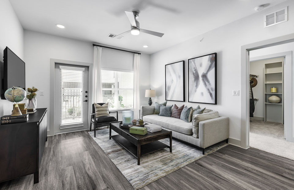 The Vaughan Apartments: Contemporary living room with modern dÃ©cor and natural lighting