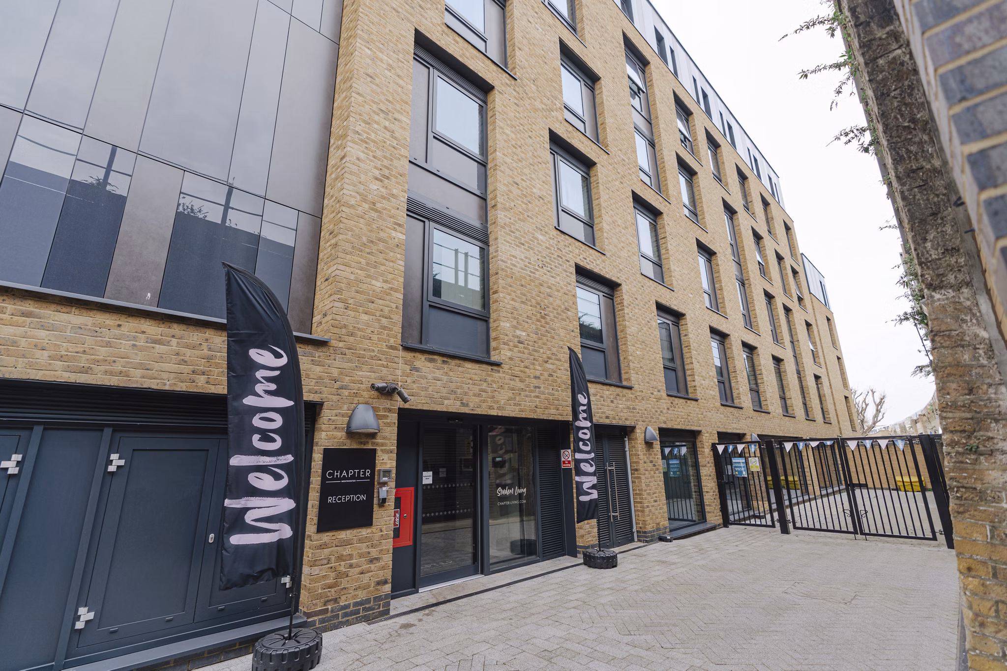 Exterior view of Chapter Westminster featuring contemporary brickwork and a welcoming entrance.