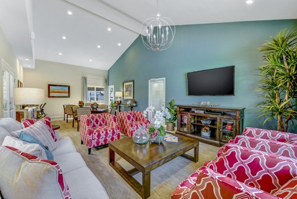 Clubhouse with modern furnishings at Adagio Apartments, luxury community living in a scenic environment