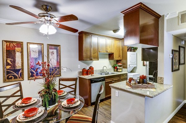 Dining room featuring elegant furnishings and modern lighting in Adagio Apartments