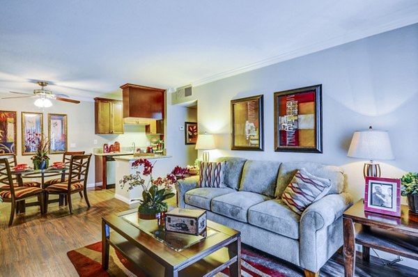 Spacious living room with modern decor and natural light at Adagio Apartments, offering luxury apartment living by Greystar