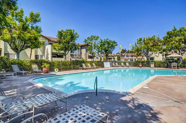 Resort-style pool area at Adagio Apartments offering luxury relaxation and leisure amenities