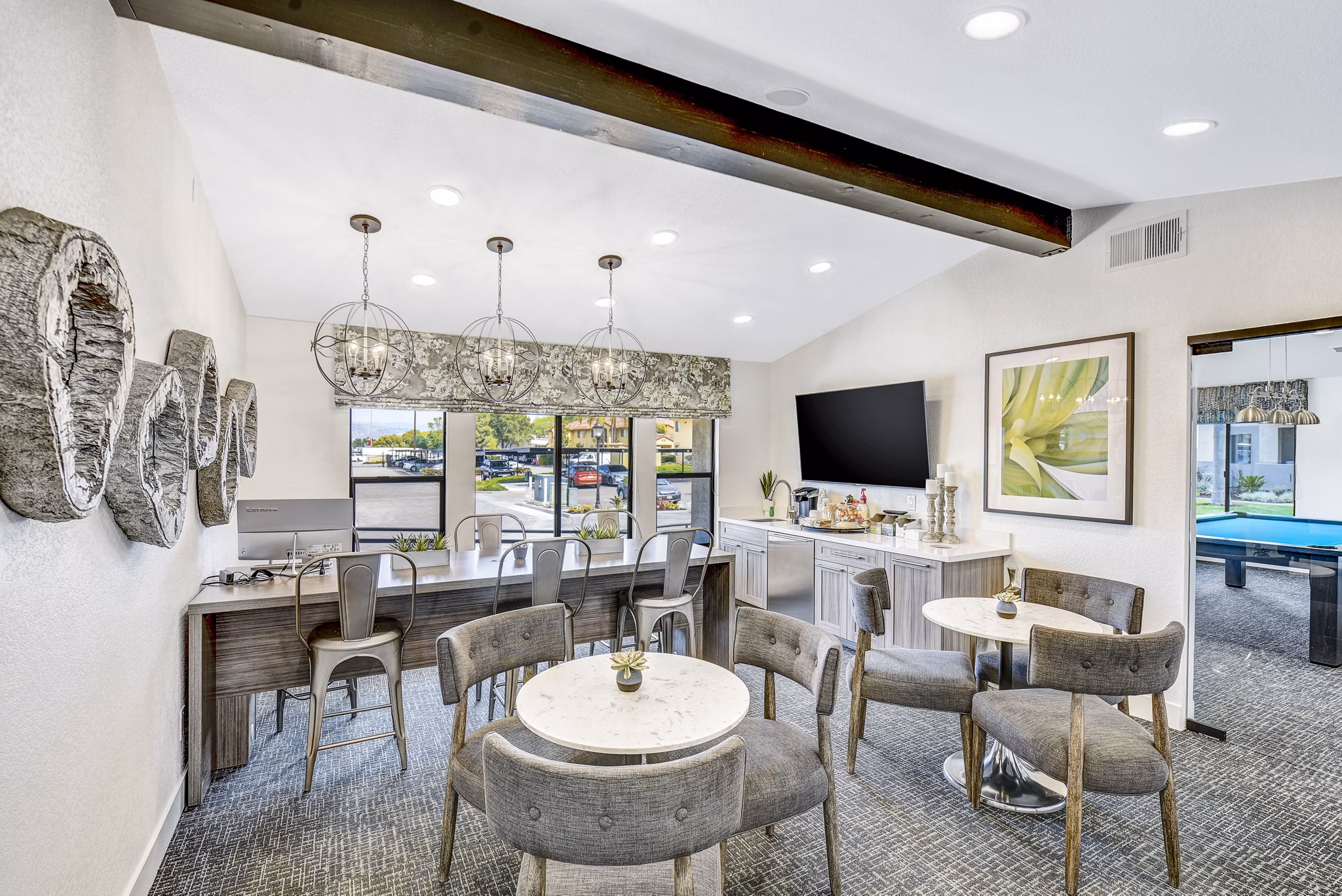 Altair Apartments: Modern clubhouse and leasing office with stylish decor and seating areas